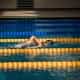 person diving in pool