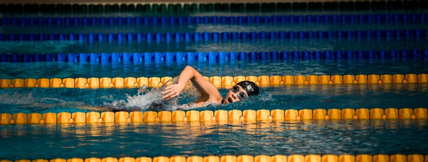 person diving in pool