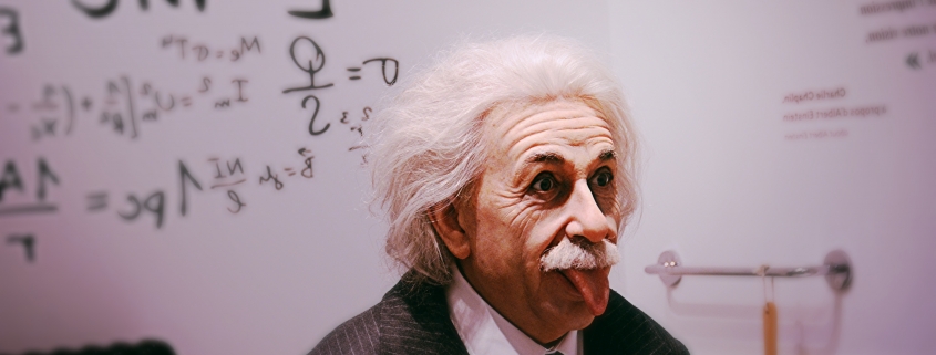 Albert Einstein licking tongue